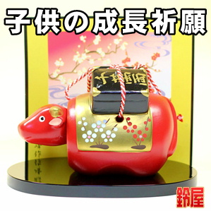 子供お守り：赤べこの置物